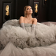 Please maintain at least one Ariana Grande Grammy’s dress worth of distance from other people while out in public.